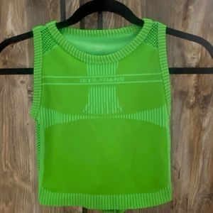 Green muscle cut tank top with open tie back in green from Urban Outfitters